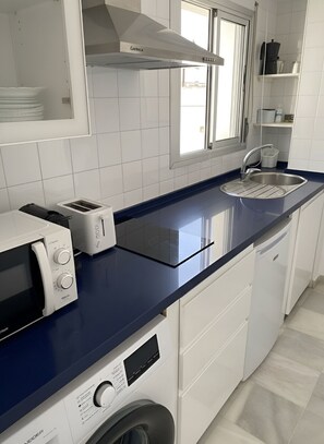 Fridge, microwave, coffee/tea maker, electric kettle