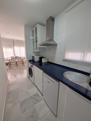 Fridge, microwave, coffee/tea maker, electric kettle