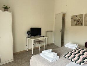 2 dormitorios, escritorio, tabla de planchar con plancha y wifi gratis