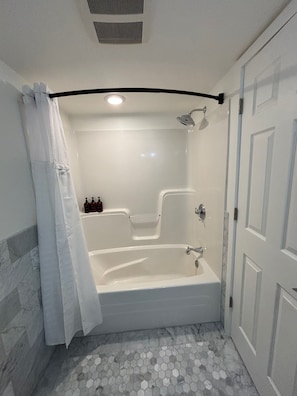 Hair dryer, towels, soap, shampoo