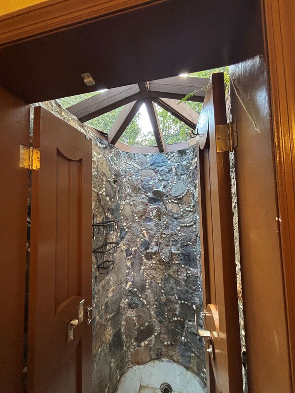 Shower, hair dryer, towels, toilet paper