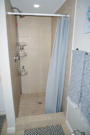 Shower, towels, soap, shampoo