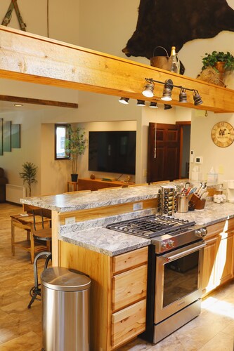 Wilderness Setting with lodge/cabin Feel.