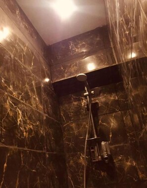 Shower, towels, soap, toilet paper - Two-Bedroom Apartment with Balcony and Sea View (Alexandria Governorate)