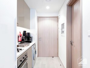 Fridge, microwave, toaster, dining tables