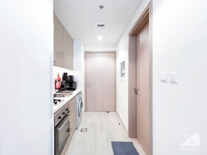 Fridge, microwave, toaster, dining tables