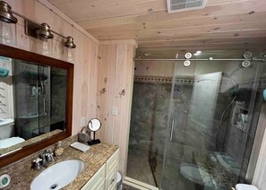 Shower, towels, soap, toilet paper