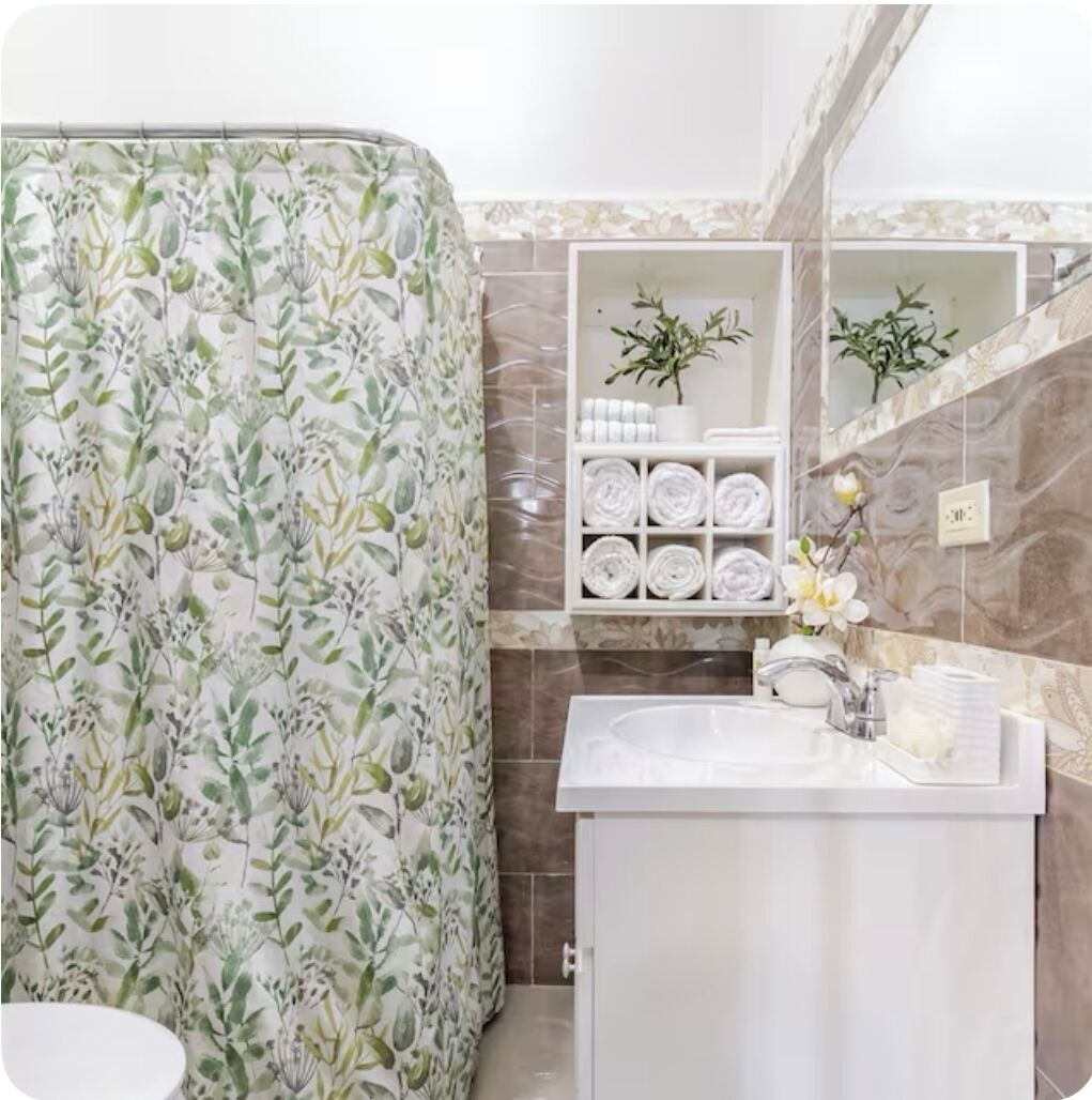 Shower, towels, soap, toilet paper