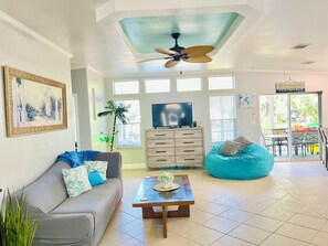 Smart TV, fireplace, foosball, books