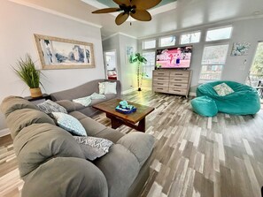 Smart TV, fireplace, foosball, books