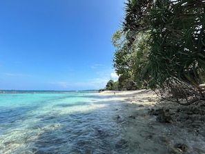 Playa privada, arena blanca