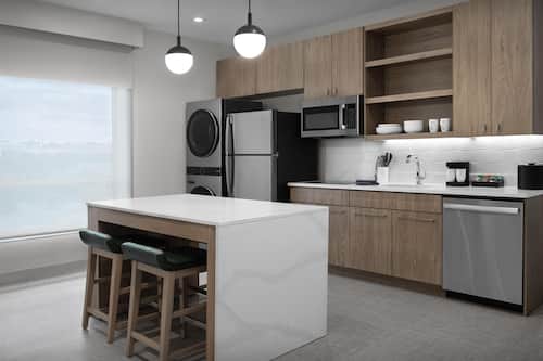 Suite, 1 King Bed | Private kitchen | Coffee/tea maker