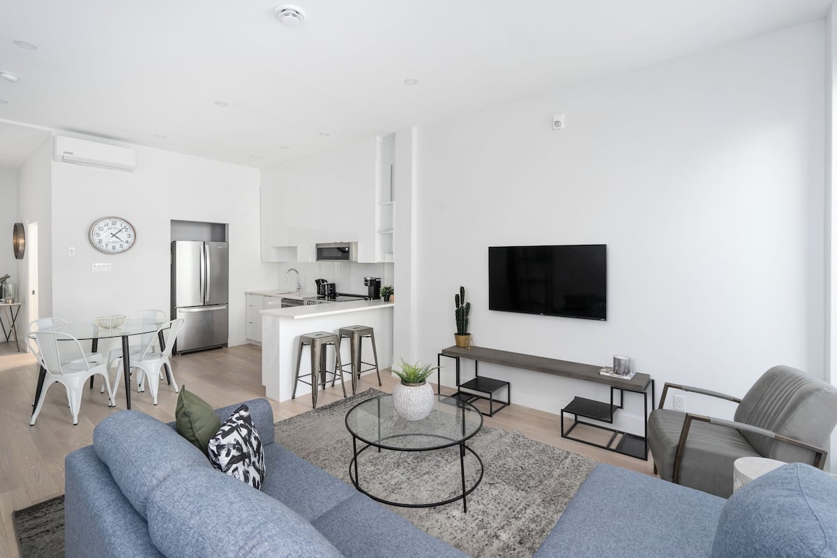 Appartement Exclusif | Coin séjour | Télévision à écran plat