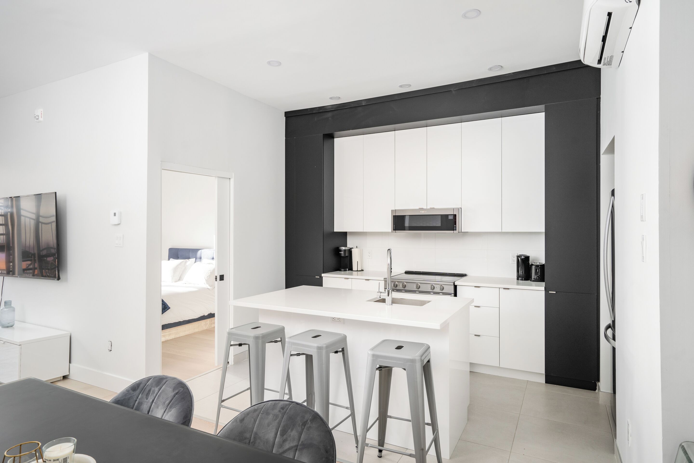 Lägenhet Deluxe | Eget kök | Stort kylskåp, mikrovågsugn, ugn och spishäll