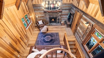 Smart TV, fireplace, books, stereo