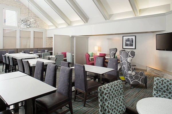 Gather for breakfast in a spacious, airy dining area.
