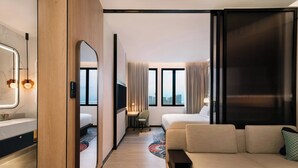 Suite Junior, 1 Tempat Tidur King, pemandangan kota | Ruang keluarga