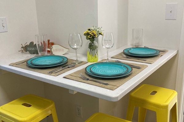 3 person dining bar located in kitchen area
