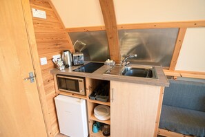 Fridge, microwave, stovetop, coffee/tea maker