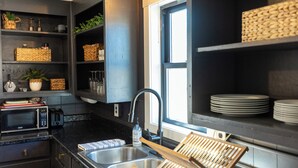 Coffee/tea maker, fridge, microwave, oven