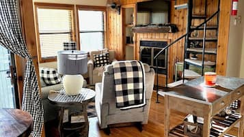 Smart TV, fireplace, books