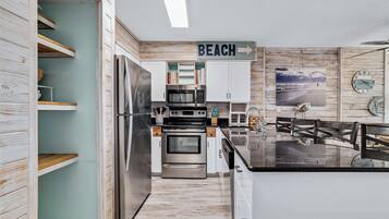 Coffee/tea maker, fridge, microwave, oven