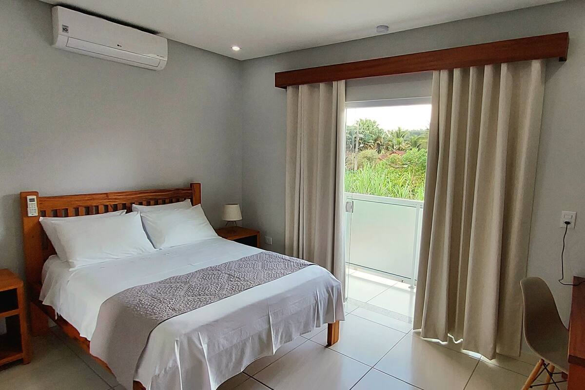 Standard Twin Room, Balcony, Garden View | In-room safe, desk, laptop workspace, blackout drapes