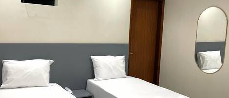 Comfort Twin Room | Desk, laptop workspace, blackout curtains, iron/ironing board