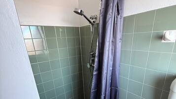 Shower, towels, soap, shampoo