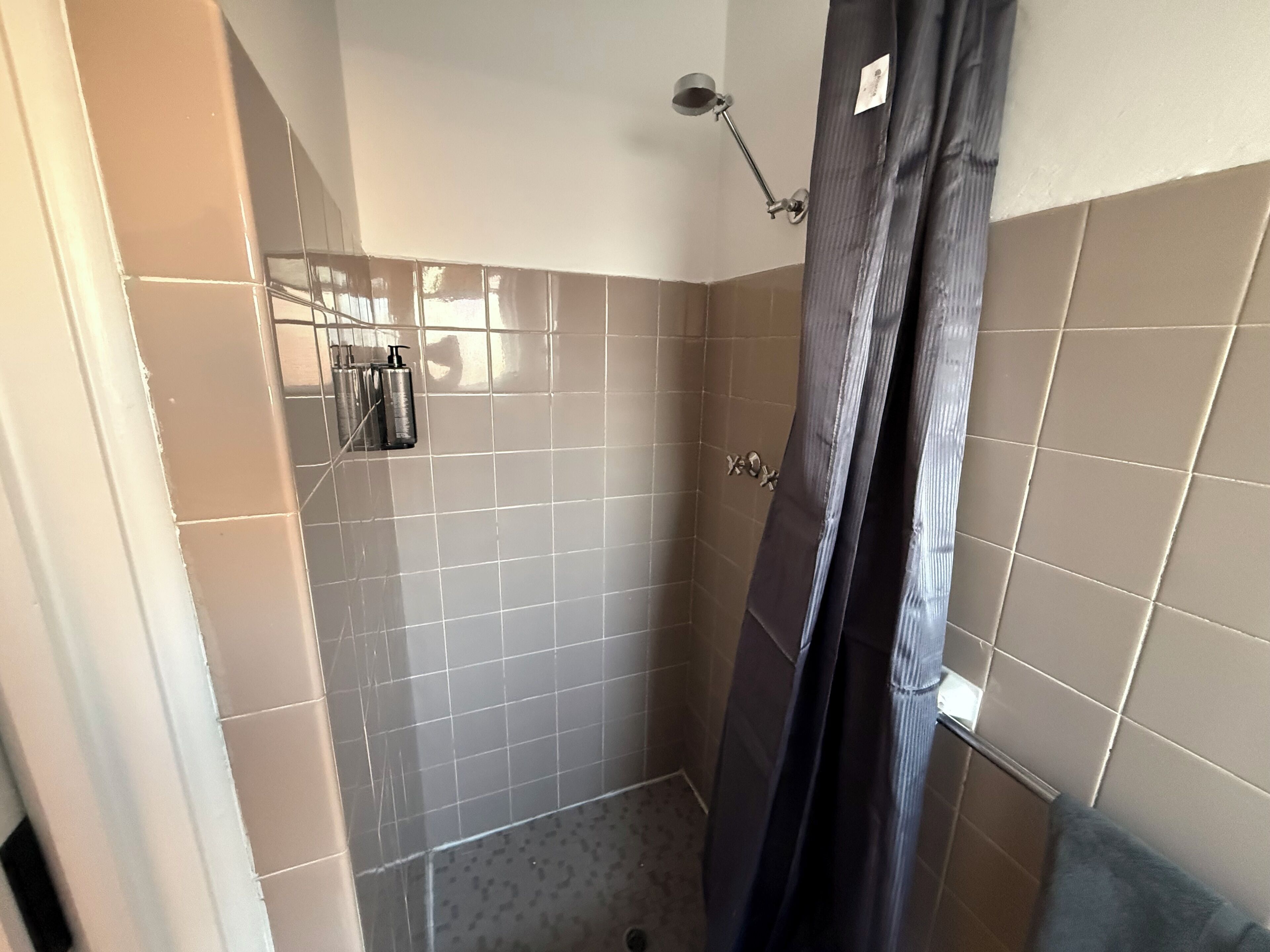 Shower, towels, soap, shampoo