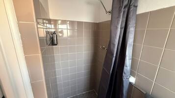 Shower, towels, soap, shampoo