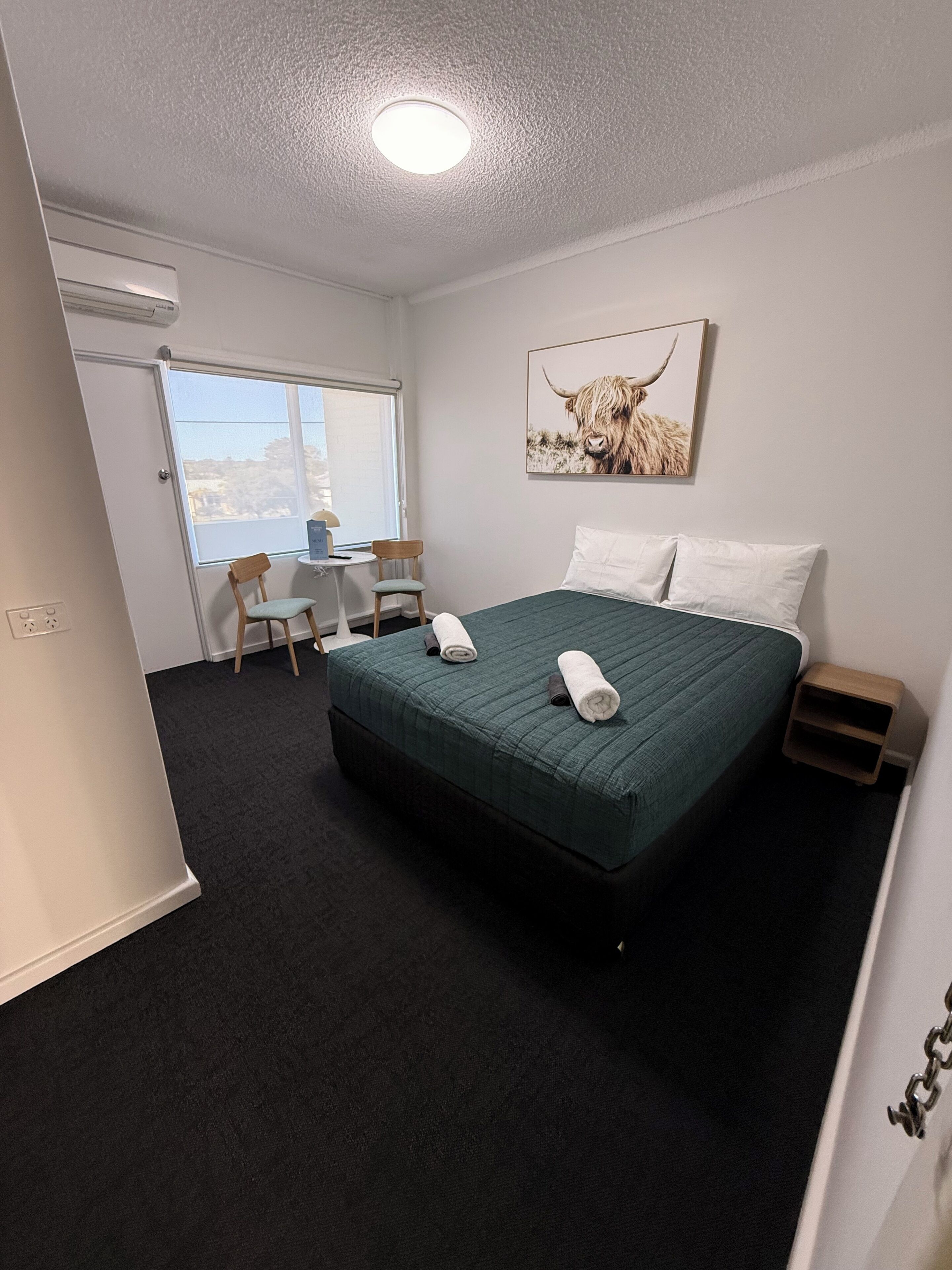 Desk, laptop workspace, WiFi (free), bed sheets