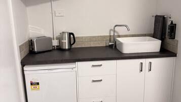 Mini-fridge, cookware/dishes/utensils