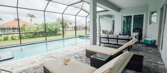 Spacious 4BR Escape with Heated Saltwater Pool & Hot Tub – Near Beaches & Golf