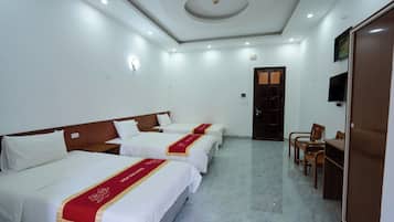 Chambre Triple Standard, vue ville | Fer et planche Ă  repasser, Wi-Fi gratuit