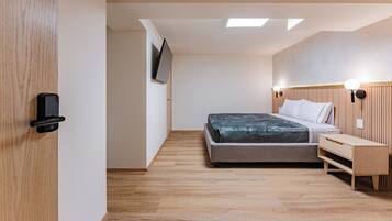 1 bedroom, desk, iron/ironing board, travel crib