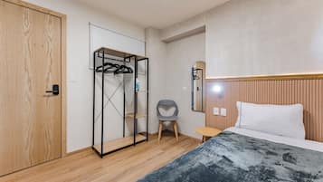 1 bedroom, desk, iron/ironing board, travel crib
