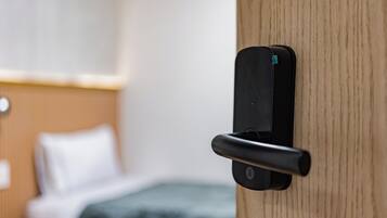 1 bedroom, desk, iron/ironing board, travel crib