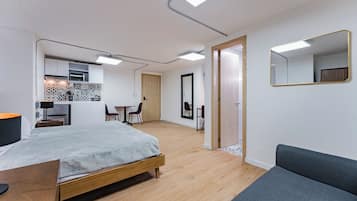 1 bedroom, desk, iron/ironing board, travel crib