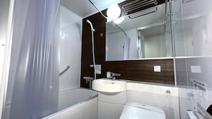 A modern bathroom with a glass shower enclosure, a white sink, and a toilet. - Hotel Alpha-One Mishima (Mishima)