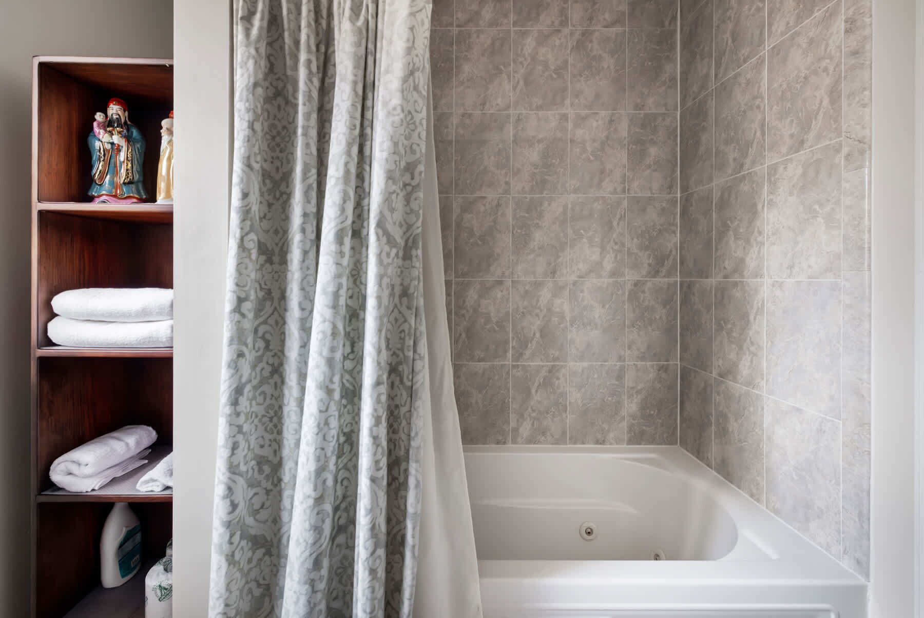 Shower, hair dryer, towels, shampoo