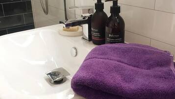 Hair dryer, bidet, towels, soap