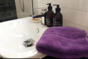 Hair dryer, bidet, towels, soap
