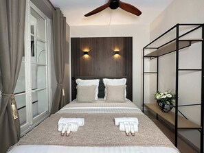 1 bedroom, desk, iron/ironing board, travel cot