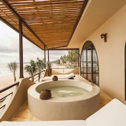 Quarto superluxo, vista para a praia | Banheira de imersão