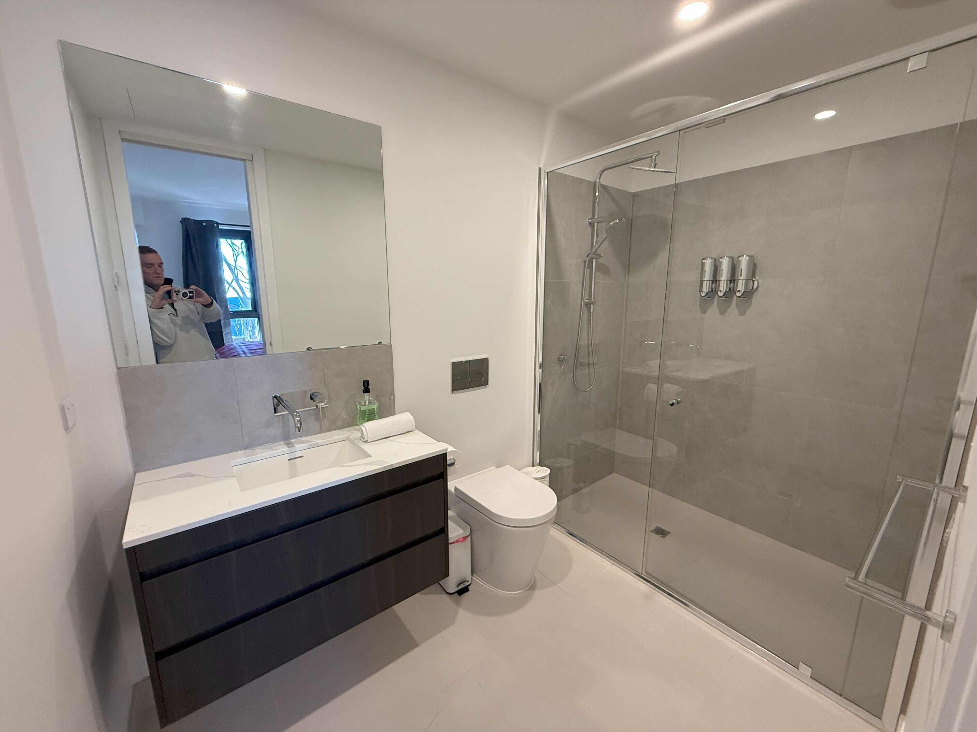 Shower, eco-friendly toiletries, hair dryer, towels