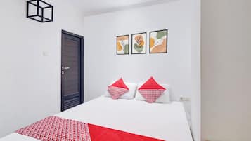 Premium bedding, laptop workspace, free WiFi, bed sheets