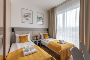 Chambre Classique avec lits jumeaux | Bureau, espace de travail pour ordinateur portable, Wi-Fi gratuit