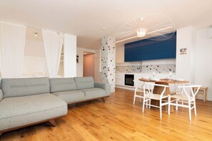 Appartement Supérieur, vue ville | Coin séjour