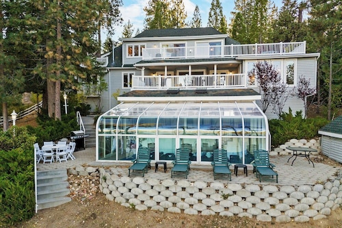 Lakefront Splendor:Spectacular Lakefront Property w/Private Dock! Pool Table + Foosball Table! Spacious Outdoor Deck! Patio & Yard w/Firepit!